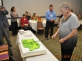 PRPNW Marian Dent-Hoglund cuts the cake