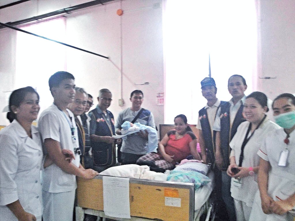 FRA Branch 154 officers, Art Gongon, Mel Tagudar, Ike Espiritu, John D. Lee, Ed Narvaez Sr. with Hospital staff presented cash to the 4th of July Baby at Baguio General Hospital, Philippines.