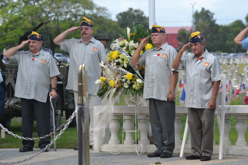 "After performing a Two-Bell ceremony, FRA Branch 367 President Richard Moran, Secretary Scott M. Simms, Vice President Don Randolph and Chaplain Joe Alvarado (L-R) present a wreath at America's Forgotten Veterans Cemetery (Clark Veterans Cemetery, Philippines) on Veterans Day 2013. The well attended observance was hosted by VFW 2485. Photographer: S/m Lee Vatter."